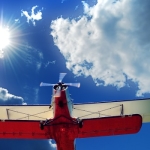 Biplane in clouds