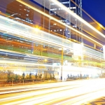 Modern City with blurred light to show speed