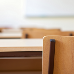 admissions strategy desks in classroom concept