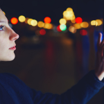 Woman at Map Touchscreen