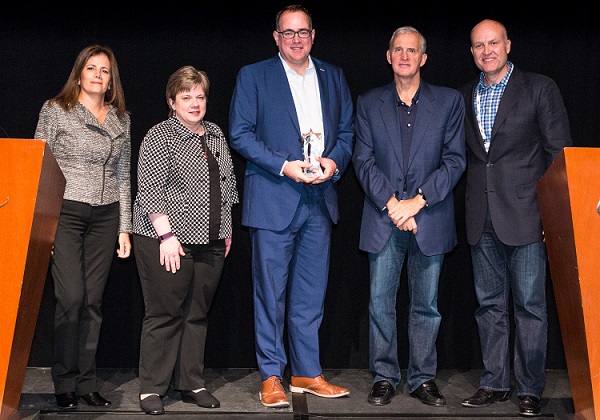 Tim Kreytak Accepting IBM Business Intelligence Partner of the Year Award