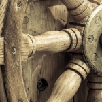 Wooden steering wheel on a ship reflects the direction that Nova Biomedical is steering its sales team.